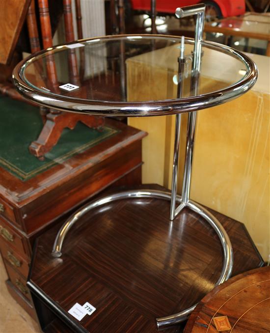 A chrome plated framed circular glass occasional table